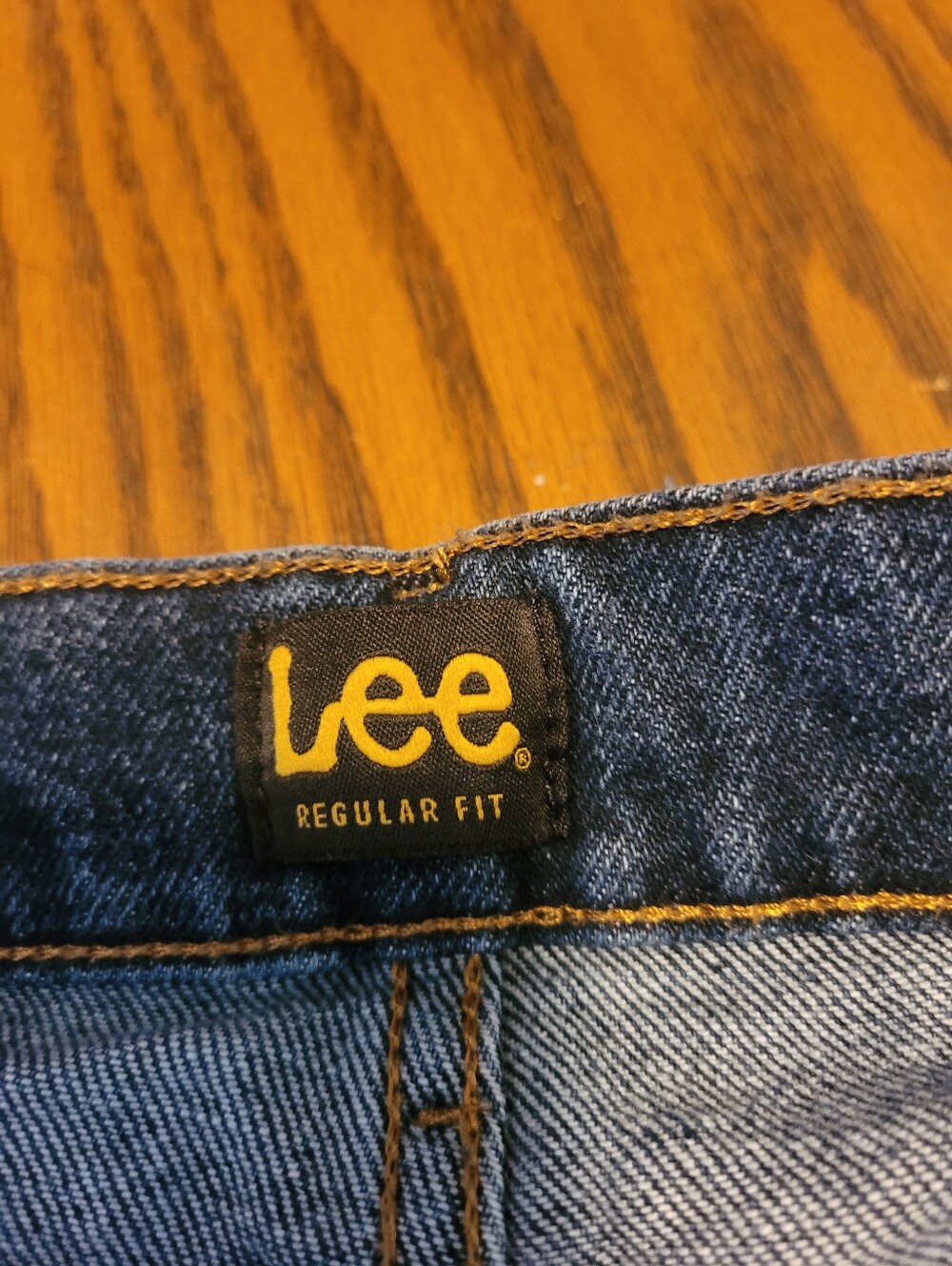 Lee Jeans with Yellow Logo on Dark Blue Denim